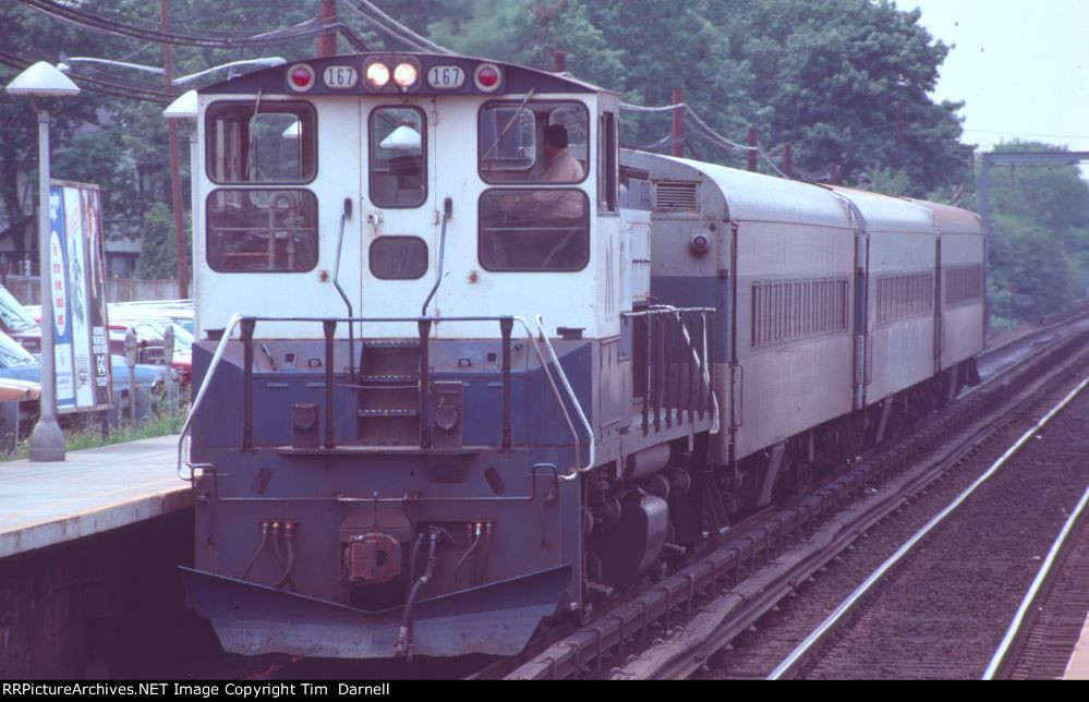 LI 167 comes east on Oyster Bay train.